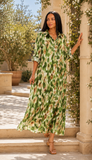 manches-trois-quarts.jpg
Robe longue beige et vert foncé portée en manches trois-quarts
