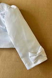 Boléro blanc en satin manches longues pour petite fille avec fleur et nœud papillon